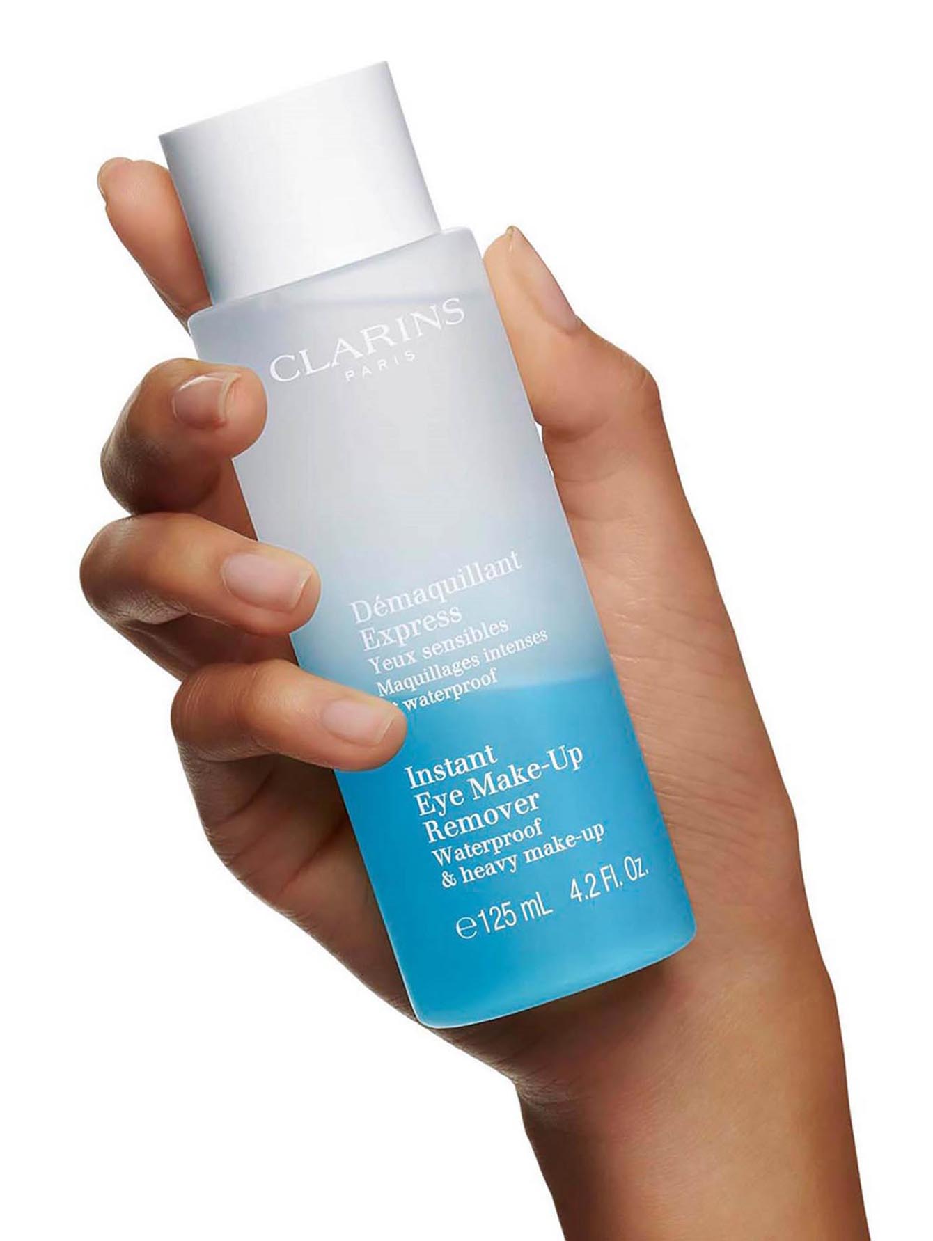 Instant eye. Clarins gentle Eye Makeup Remover Waterproof. Clarins Demaquillant Express. Clarins средство для снятия макияжа с глаз. Clarins средство для быстрого удаления макияжа с глаз.